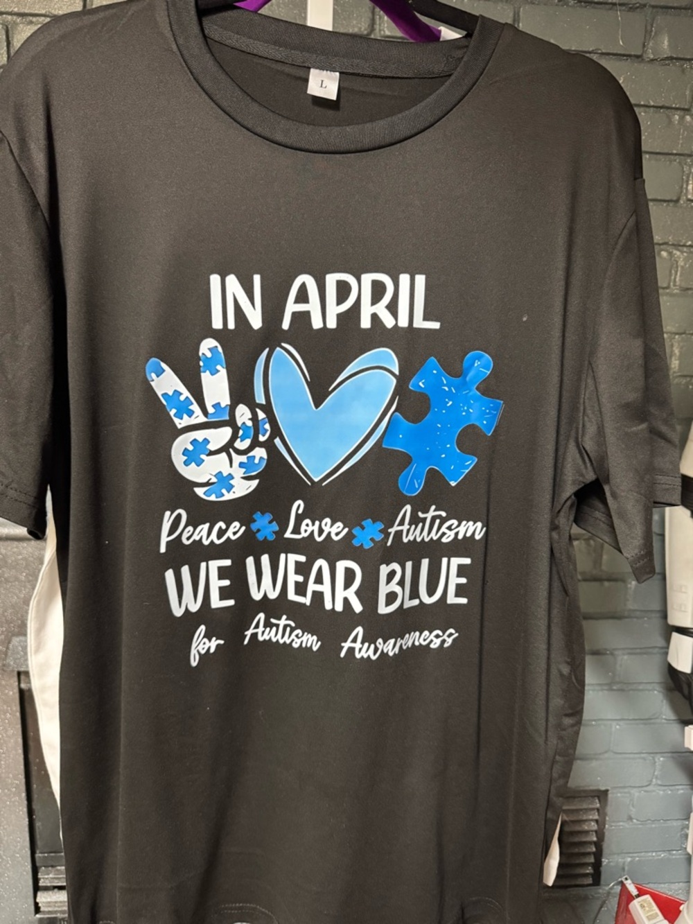 In April We Wear Blue Autism Awareness T-Shirt - Black with Blue Print